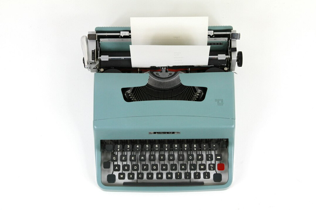 typewriter with paper