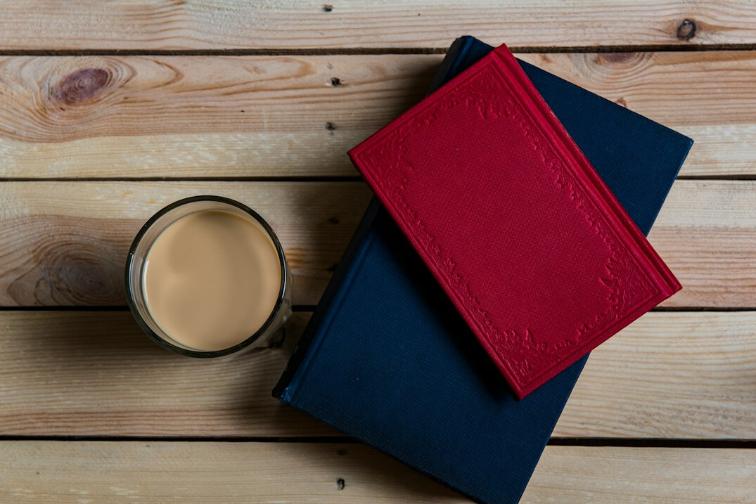 mystery books on wooden table